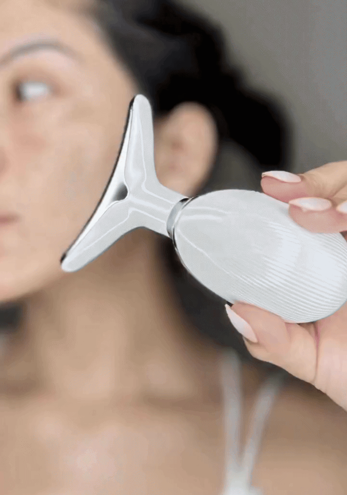 ZAMORA MART anti-wrinkle beauty apparatus showing a handheld device used for facial lifting and skin tightening.