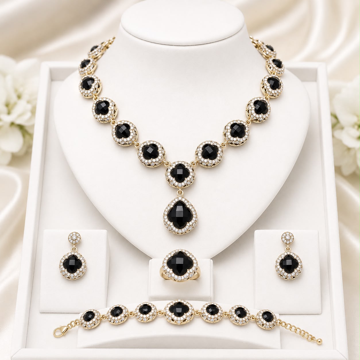 Elegant jewelry set by ZAMORA MART featuring matching necklace and earrings with intricate design.