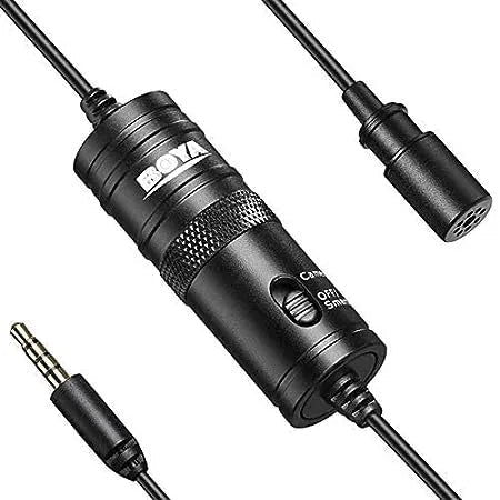 ZAMORA MART Boya lavalier microphone clipped on clothing, compact and portable for clear audio recording.