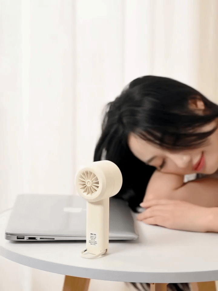 ZAMORA MART Hoco portable handheld fan with ergonomic handle and blue casing, ideal for personal cooling.