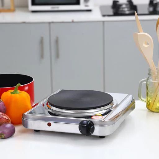 ZAMORA MART electric hot plate with black surface and control knob, compact kitchen appliance for heating food.
