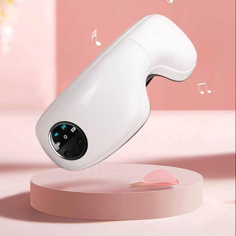 ZAMORA MART eye massager tool with ergonomic design, featuring soft silicone pads for relaxing eye massage and tension relief.