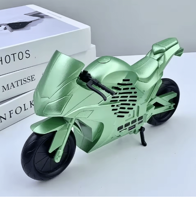 Portable motorcycle-shaped speaker by ZAMORA MART with sleek design, ideal for motorcycle enthusiasts and outdoor music listening.