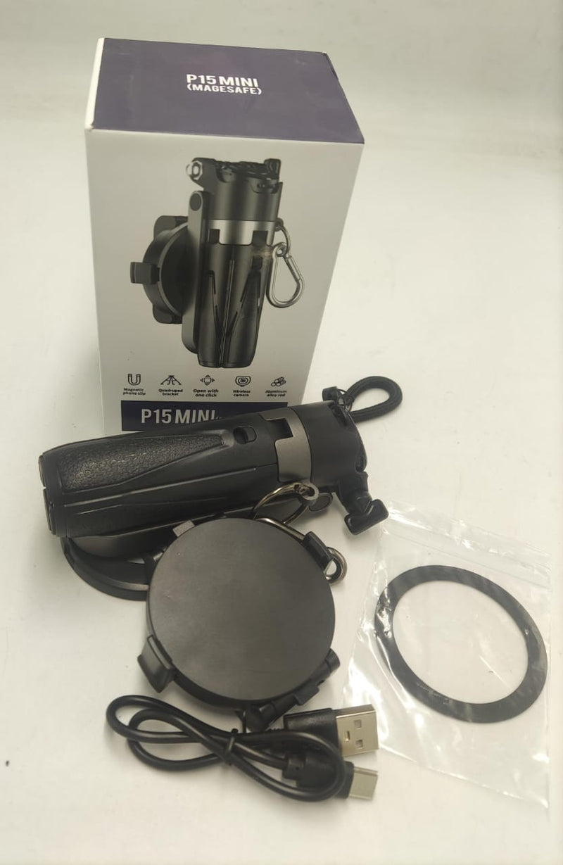 ZAMORA MART mini phone tripod and selfie stick holding a smartphone for hands-free photos and selfies.