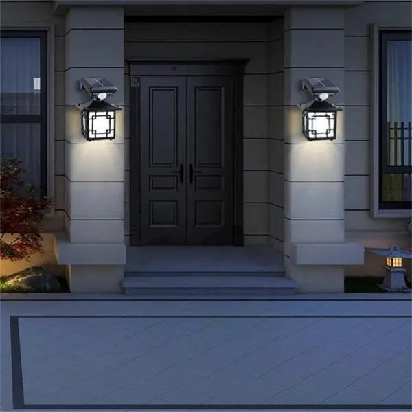ZAMORA MART outdoor solar sensor light mounted on wall, with LED bulb, solar panel, and motion sensor for outdoor security and illumination