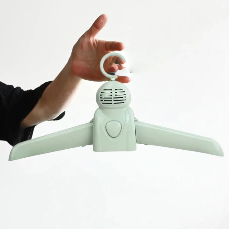 ZAMORA MART portable shoe dryer with compact design for quick drying of shoes and clothes.