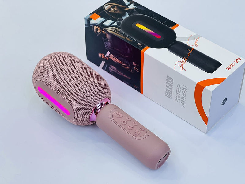 ZAMORA MART portable wireless speaker with compact design, black color, and control buttons visible on the top.