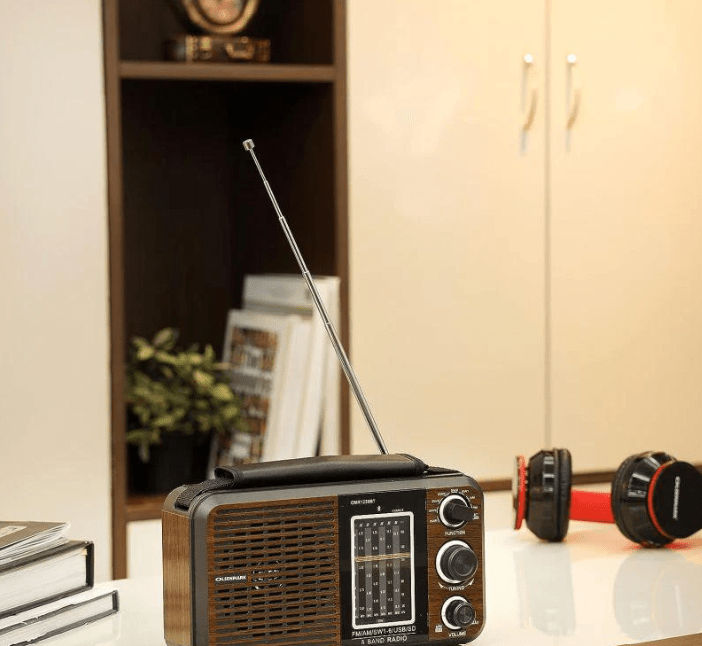 Rechargeable ZAMORA MART radio with digital display, portable design, and built-in speaker for versatile listening.