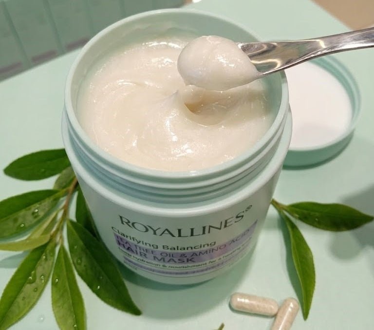 ZAMORA MART Amino Acid Hair Mask with tea tree oil for nourishing and clarifying hair treatment, visible in the image.