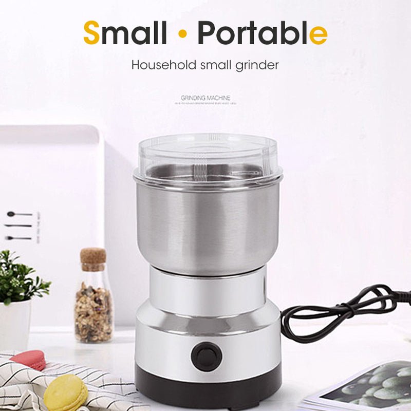 Stainless steel ZAMORA MART electric grinder for grinding spices and herbs, with a sleek metallic finish and compact design.