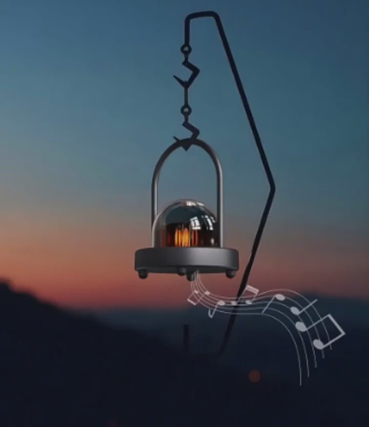 White ZAMORA MART camping lamp emitting ambient light, ideal for outdoor camping and nighttime activities.