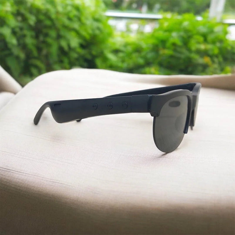 Wireless headset glasses by ZAMORA MART featuring sleek design, built-in headphones, and comfortable fit for hands-free audio.